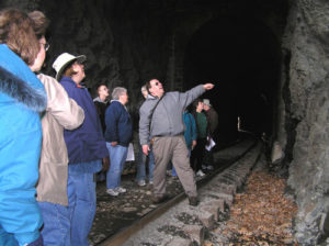 group of people in tunnel